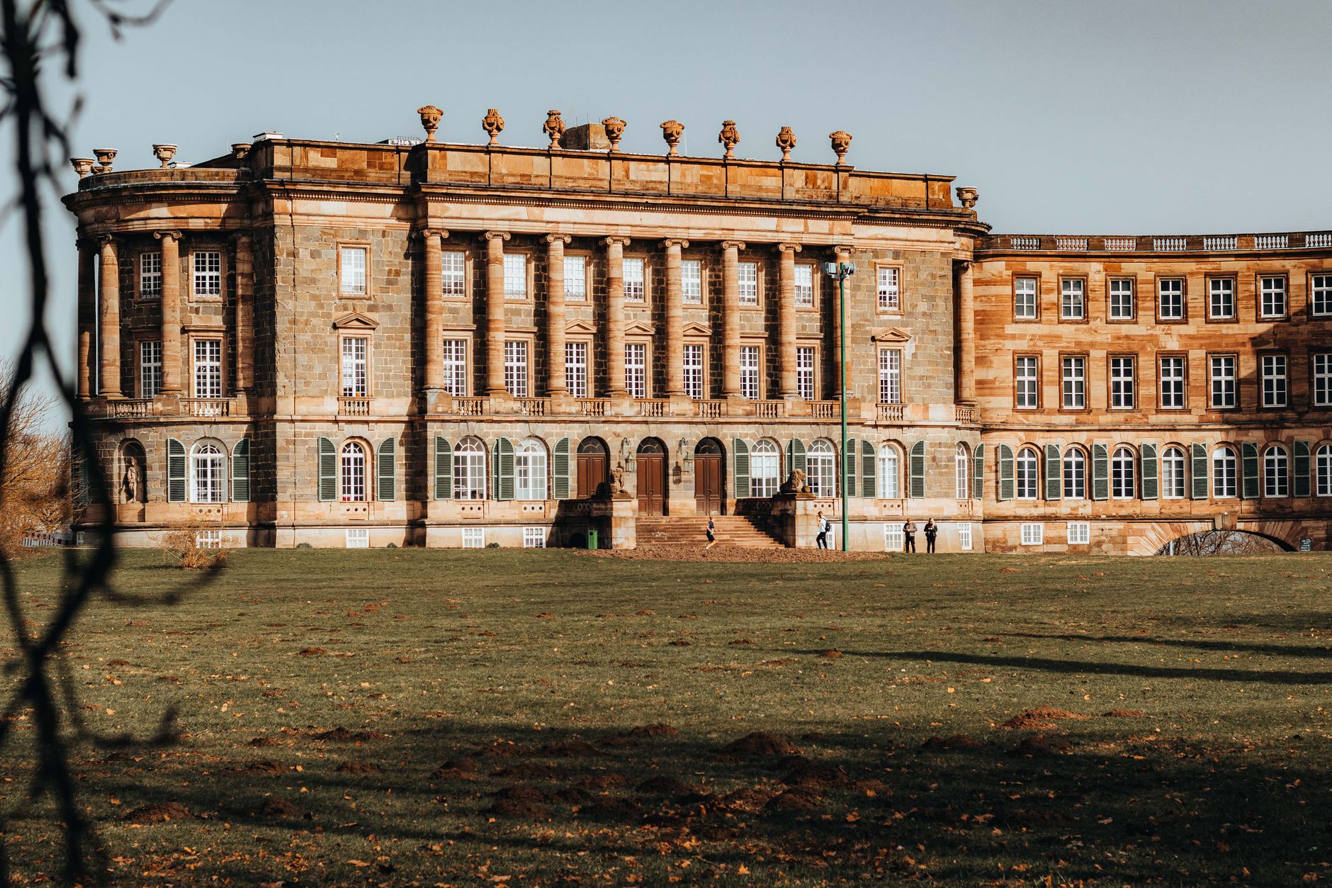 Explore the historic Wilhelmshöhe Palace in Kassel, showcasing stunning baroque architecture in a scenic park setting.